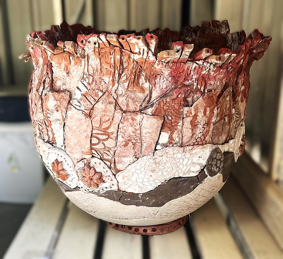 Large textured brown pottery pot